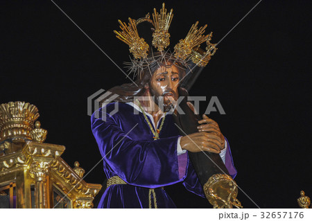 Holy week procession in Spain, Andalusia. 32657176