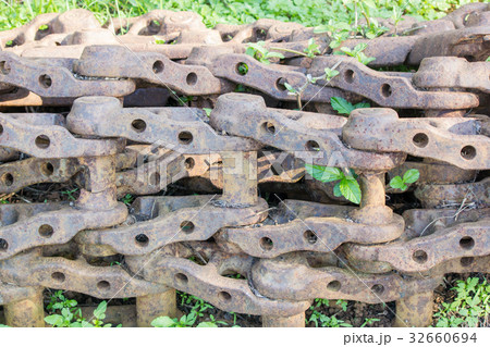 Close up old backhoe chain wheel with rusty 32660694