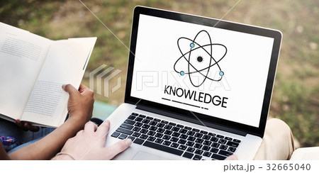 Hands working on laptop network graphic overlay 32665040