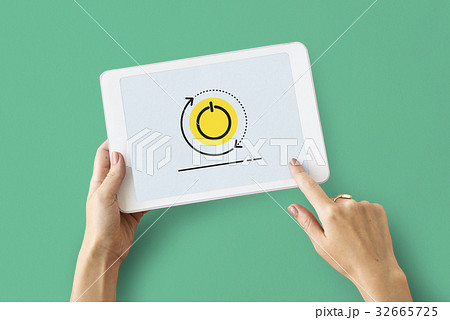 Hands working on digital device network graphic overlay 32665725
