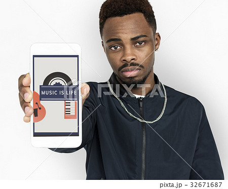 Man holding digital device network graphic overlay Man holding digital device network graphic overlay 32671687