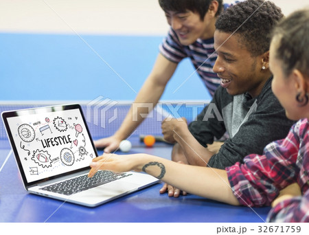 Students working on laptop network graphic overlay Students working on laptop network graphic overlay 32671759