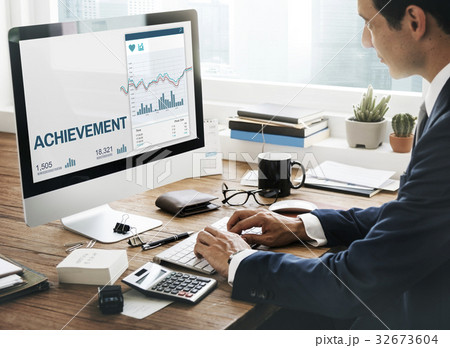 Man working on computer network graphic overlay 32673604