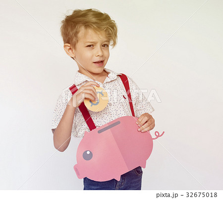 Kid Holding Piggybank Saving Money Kid Holding Piggybank Saving Money 32675018