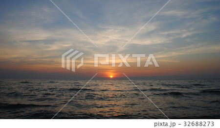 Beautiful sunset over the ocean. Sunrise in the s Beautiful sunset over the ocean. Sunrise in the s 32688273