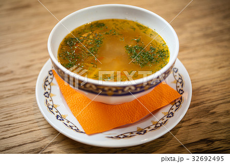 Chicken soup with noodles Chicken soup with noodles 32692495