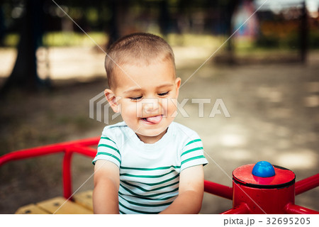 Little boy is a bright playground. Little boy is a bright playground. 32695205