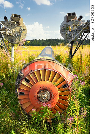 Old airplane fuselage on green grass Old airplane fuselage on green grass 32700258