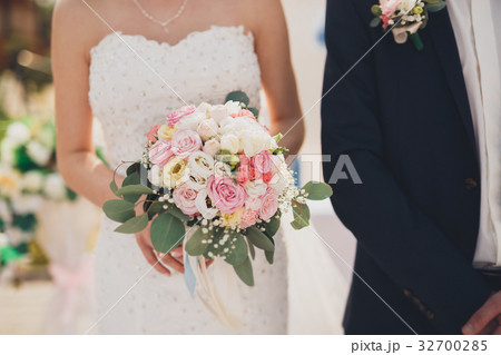 Pretty good wedding bouquet of various flowers in 32700285