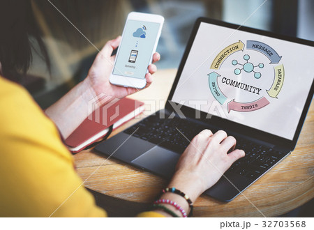 Woman working on laptop network graphic overlay 32703568