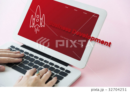 Hands working on laptop network connection graphic Hands working on laptop network connection graphic 32704251