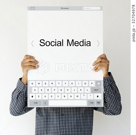 Hands holding network graphic overlay billboard covering face Hands holding network graphic overlay billboard covering face 32704978