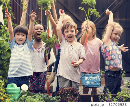 Group of kindergarten kids learning gardening outdoors Group of kindergarten kids learning gardening outdoors 32706928