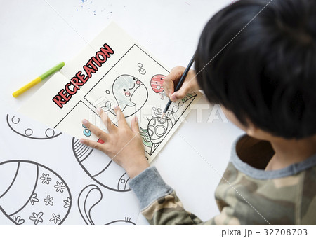 Young boy working on drawing pad network graphic overlay Young boy working on drawing pad network graphic overlay 32708703