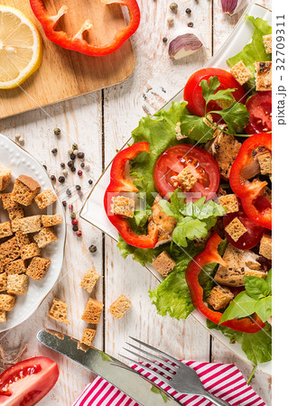 Caesar salad on rustic background 32709311