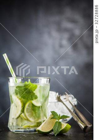 Mojito cocktail on dark background Mojito cocktail on dark background 32728886