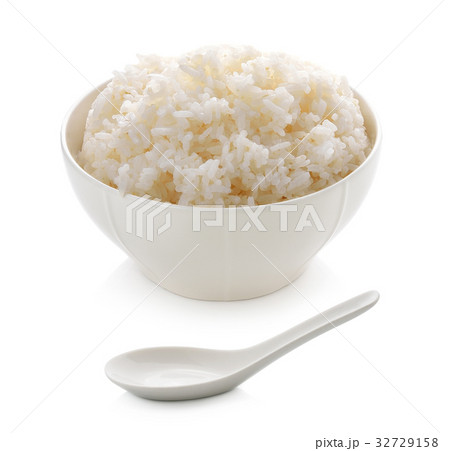 rice in a bowl and ceramic spoon isolated on white rice in a bowl and ceramic spoon isolated on white 32729158