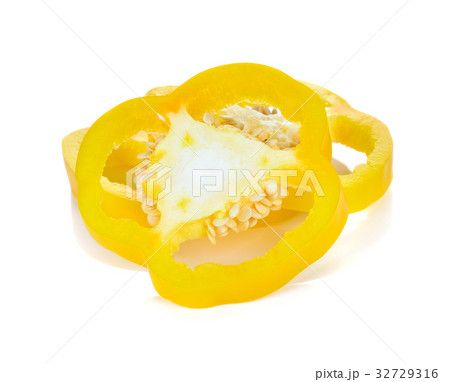 yellow pepper slices on white background yellow pepper slices on white background 32729316