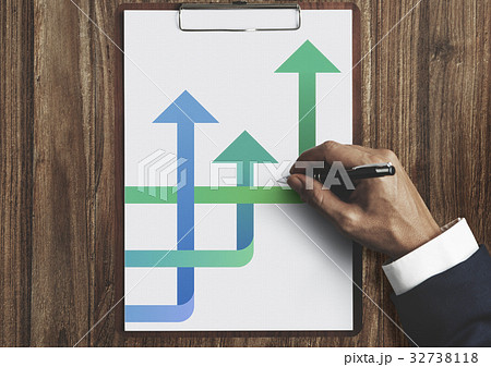 Hands Writing Business Plan on the Sheet 32738118