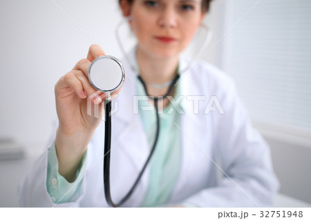 Doctor with a stethoscope in the hands 32751948
