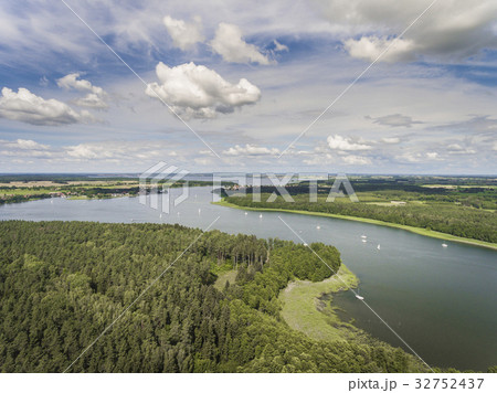 Aerial view of green islands on the lake in Poland Aerial view of green islands on the lake in Poland 32752437