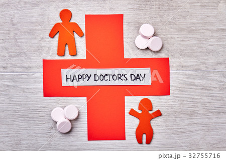 Cross, pills and congratulation card. 32755716