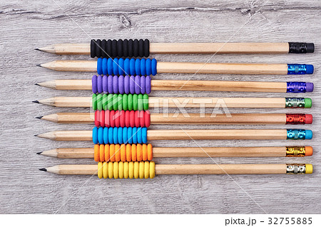 Graphite pencils on wooden backdrop. Graphite pencils on wooden backdrop. 32755885