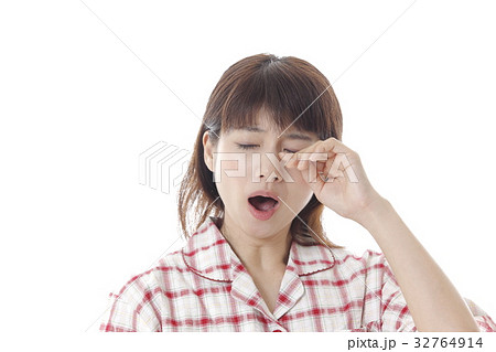 あくびをする女性の写真素材