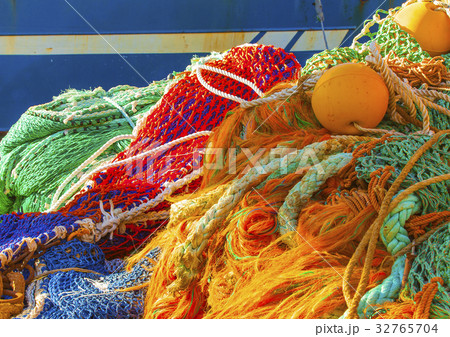 colored fishing net with floats. colored fishing net with floats. 32765704