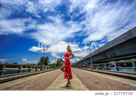 Young Woman Posing on The Sarasin Bridge Young Woman Posing on The Sarasin Bridge 32774710