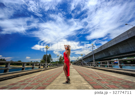 Young Woman Standing on The Sarasin Bridge Young Woman Standing on The Sarasin Bridge 32774711