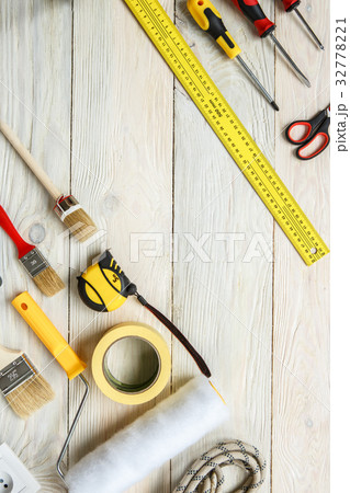 Repairment tools objects isolated on wooden Repairment tools objects isolated on wooden 32778221