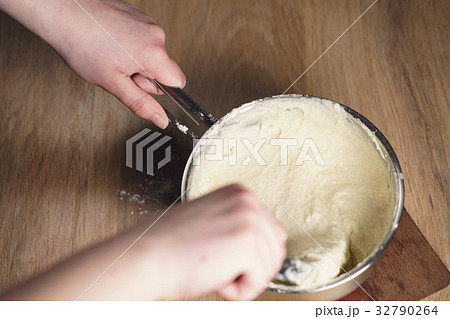 female hands mixing sticky dough 32790264