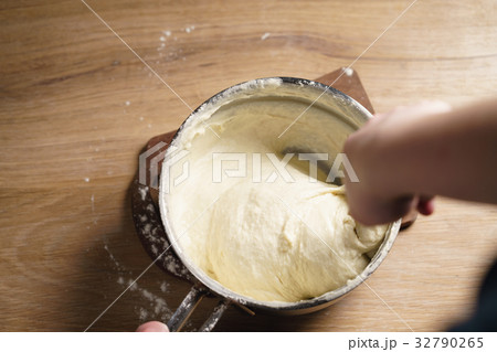 female hands mixing sticky dough 32790265