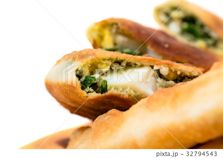 Delicious sliced puff pie with eggs. 32794543