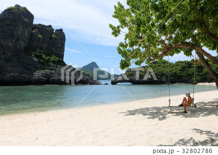 Boy relaxing on the beach 32802786