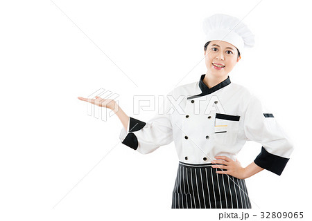 woman chef holding out hand in presentation 32809065