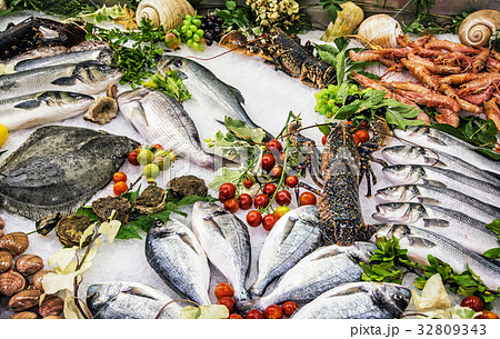 Fresh raw seafoods on counter in restaurant Fresh raw seafoods on counter in restaurant 32809343