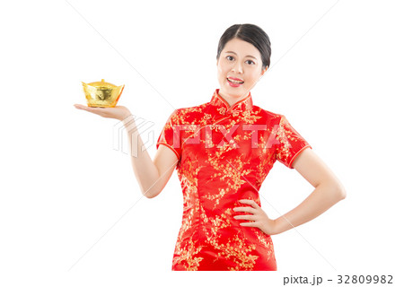 happy woman presenting golden ingot 32809982