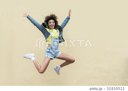 Cheerful young woman is enjoying summer day 32810521