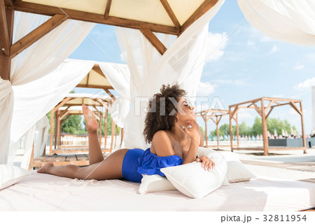 Happy youthful mulatto girl taking pleasure of 32811954