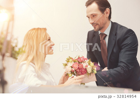 Gallant charming man greeting his colleague 32814954
