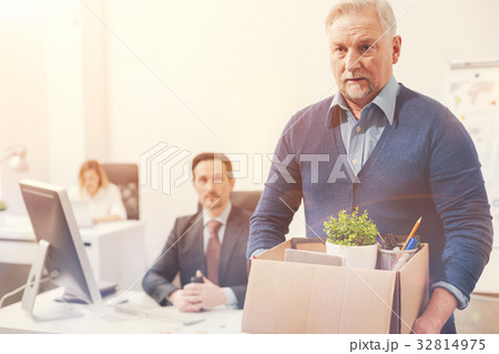 Elderly qualified businessman leaving the office 32814975