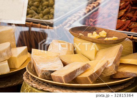Chunks of different cheeses at a local market 32815364