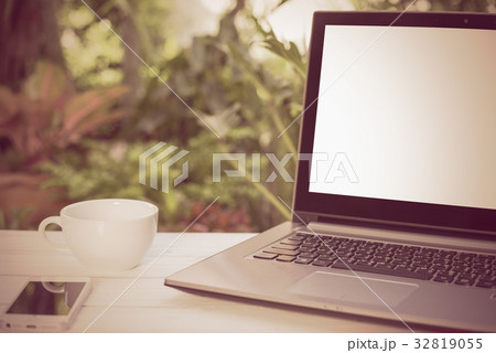 Computer laptop,mobile phone and coffee cup  32819055