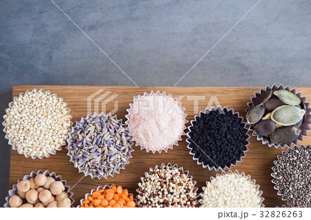 Various superfoods on gray table 32826263