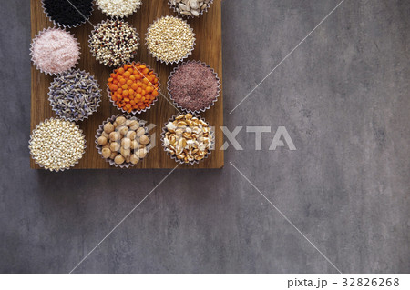 Various superfoods on gray table Various superfoods on gray table 32826268