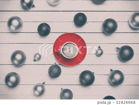Coffee and christmas balls on white background. Coffee and christmas balls on white background. 32826668