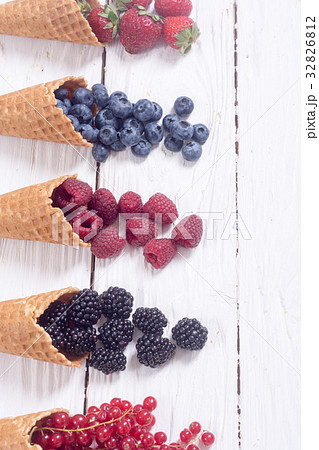Berries in ice cream cone 32826812