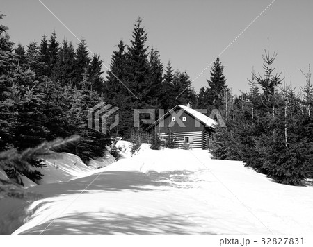 Small mountain hut in winter time 32827831